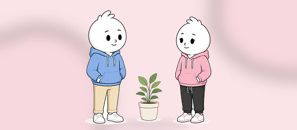 Milo and Mira standing with a plant between them
